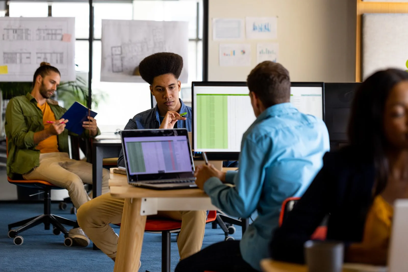 Manufacturing software team collaborating on connected operations
